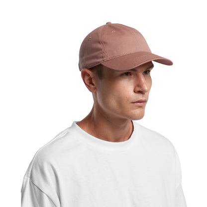 image of model wearing AS Colour Access Cap in hazy pink