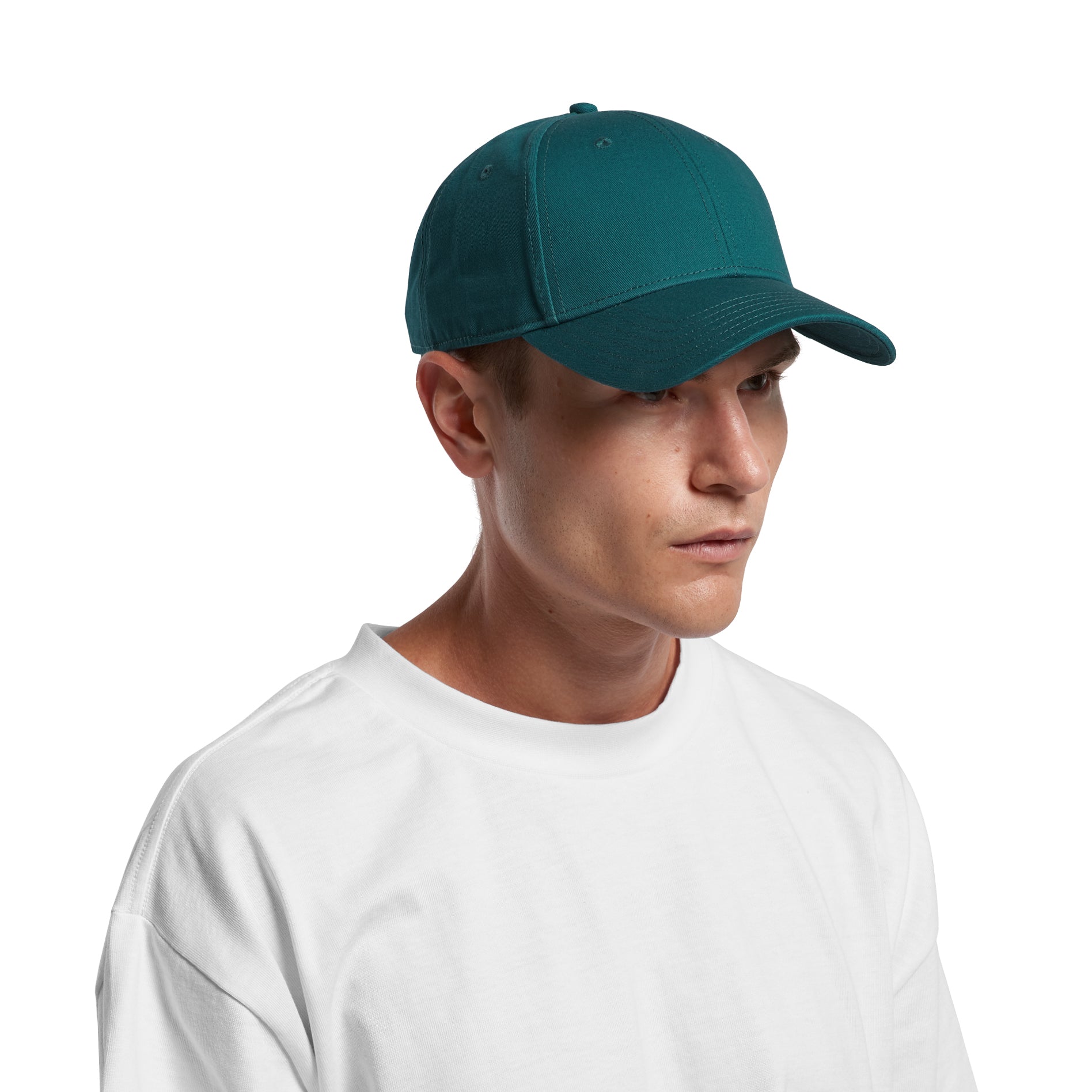 Front Image of model wearing of AS Colour Icon Cap in Cypress Green