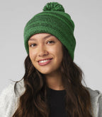 image of female model wearing the beechfield team stripe beanie in colour green photographed on a white background
