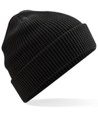 product image of Beechfield Organic Cotton Waffle Beanie in colour black photographed on a white background
