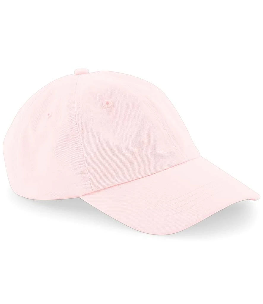 product image of Beechfield Low Profile 6 Panel Dad Cap in pastel pink viewed from the side on a white background
