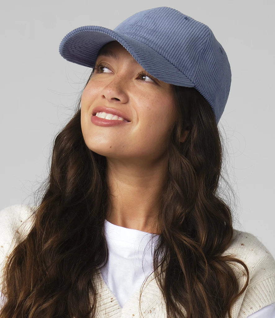 Model Image of female wearing Beechfield Corduroy Dad Cap in the colour Slate Blue pictured on a white baclground