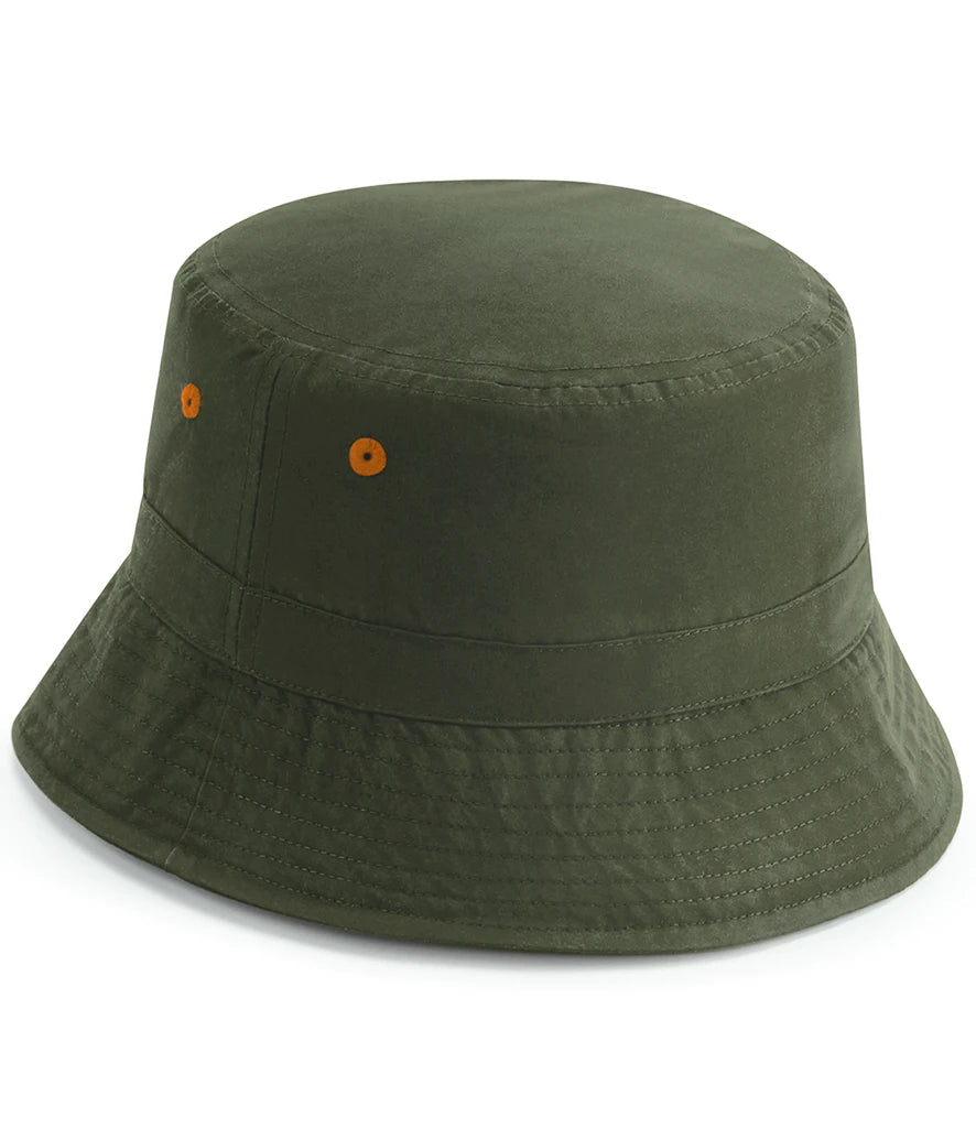 Green bucket hat with orange buttons on a white background