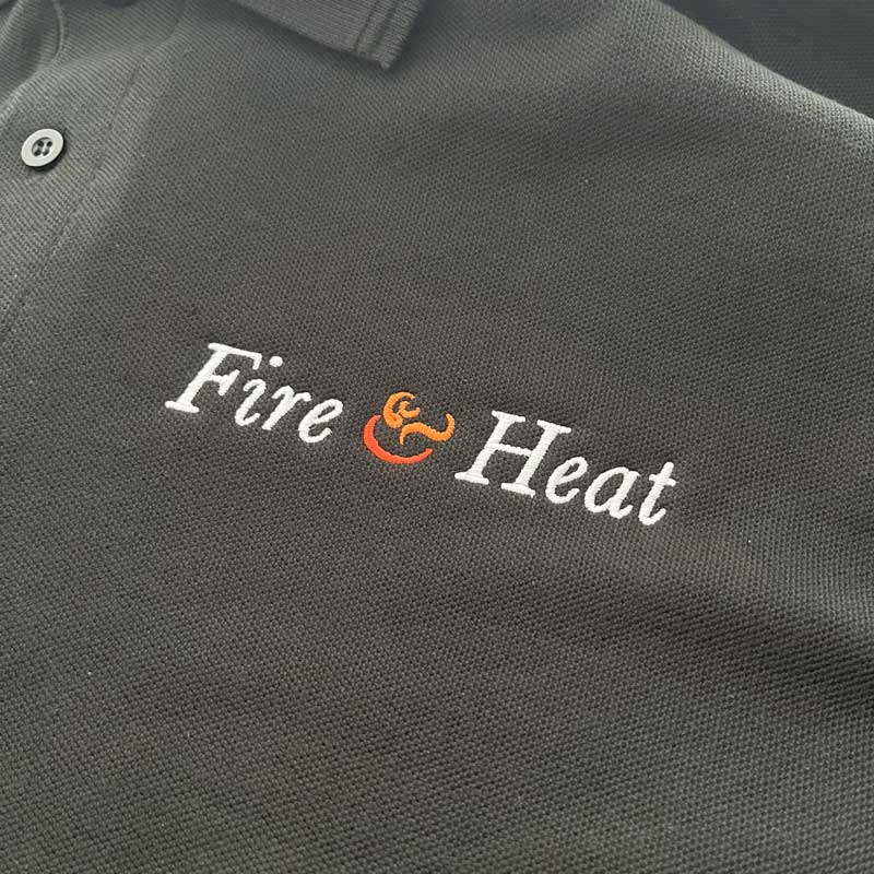 Black Polo-shirt With Fire And Heat Logo Embroidered On Chest