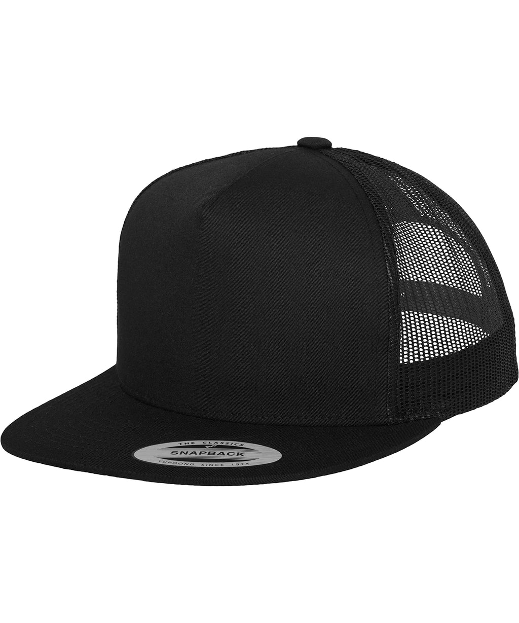 product image of flexfit classic trucker cap in the colour black viewed from the side photographed on a white background