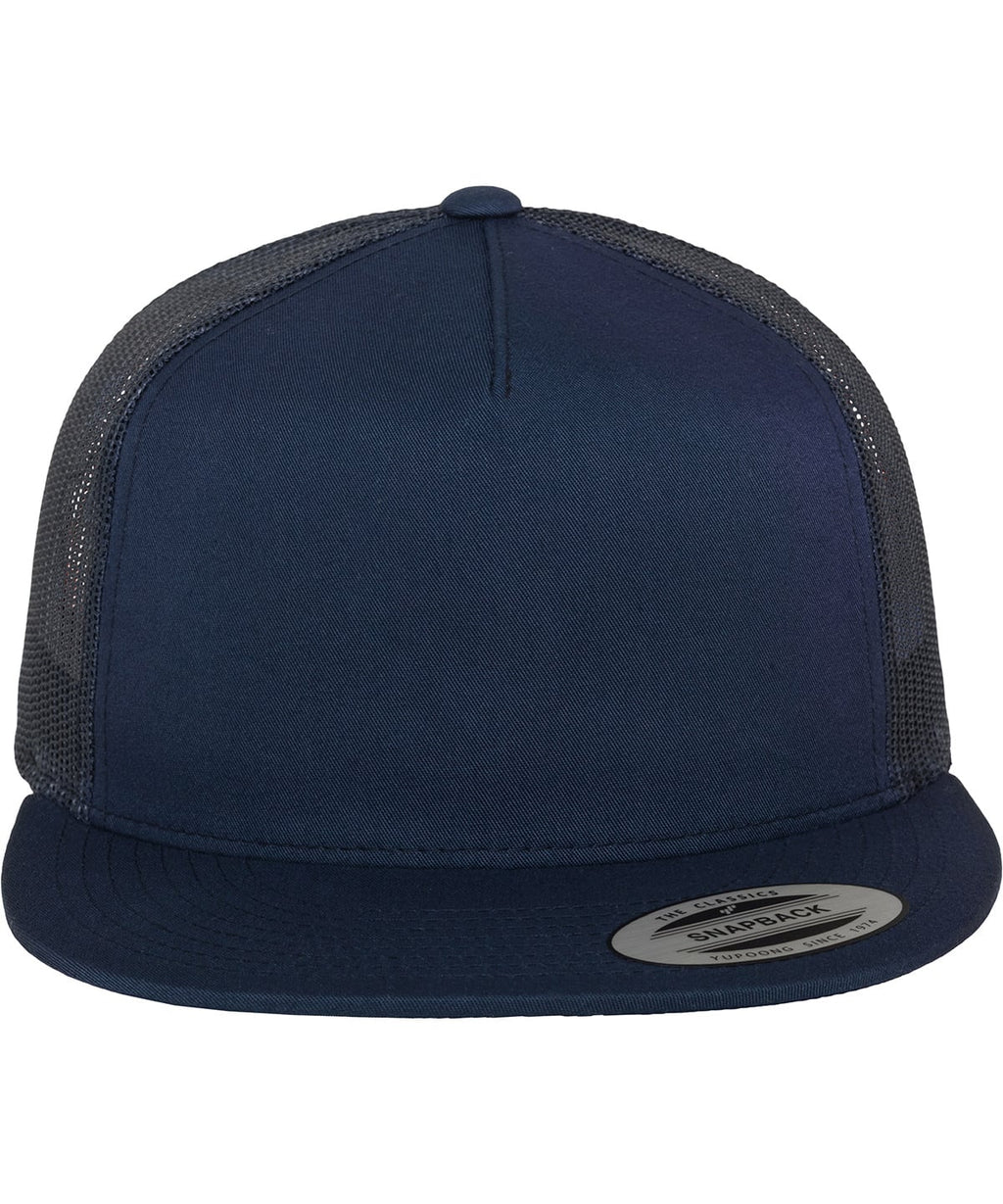 product image of flexfit classic trucker cap in the colour navy viewed from the front photographed on a white background