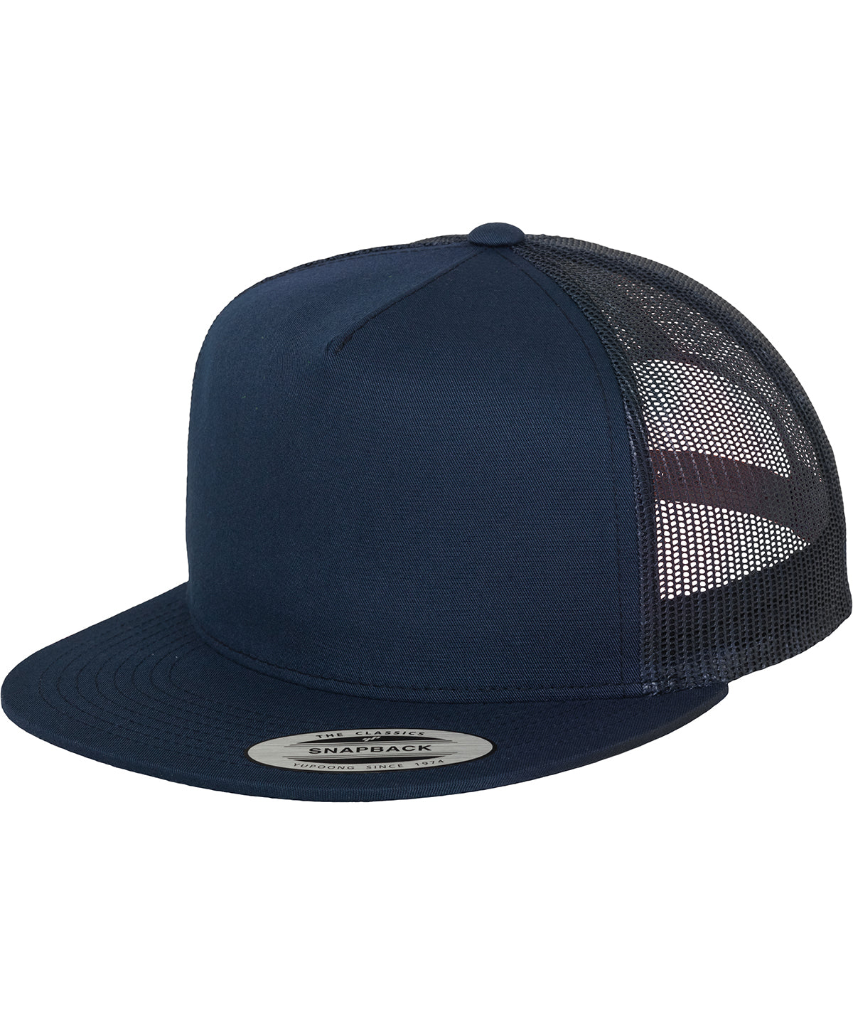 product image of flexfit classic trucker cap in the colour navy viewed from the side photographed on a white background